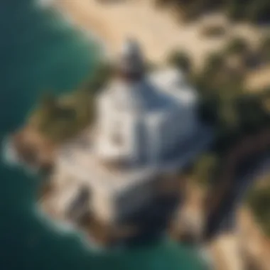 An aerial view of the Bulgari Lighthouse, emphasizing its coastal position and surroundings.