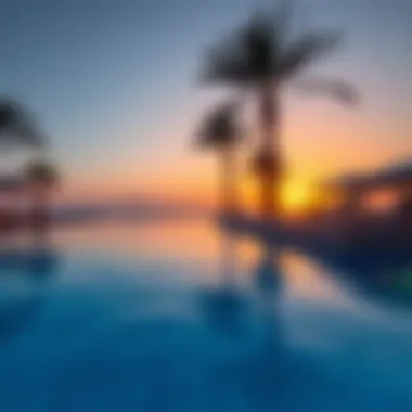 Tranquil Sunset by the Pool A serene sunset view from a private pool at a Dubai resort, highlighting relaxation and tranquility.
