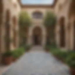 Elegant Arabian courtyard with intricate tile work and lush greenery