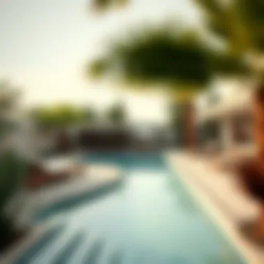 Serene outdoor pool area surrounded by lush landscaping